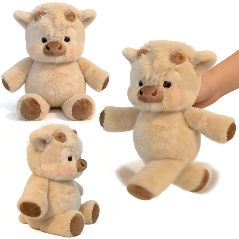 Vacas Highland de peluche de color crema