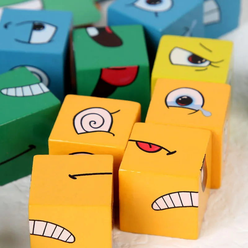 Cubos de madera con ojos y bocas pintados
