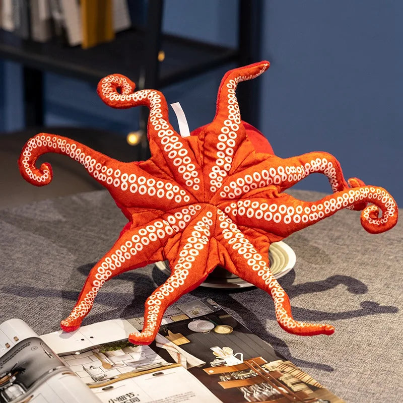 Pulpo de peluche visto desde abajo con las ventosas estampadas