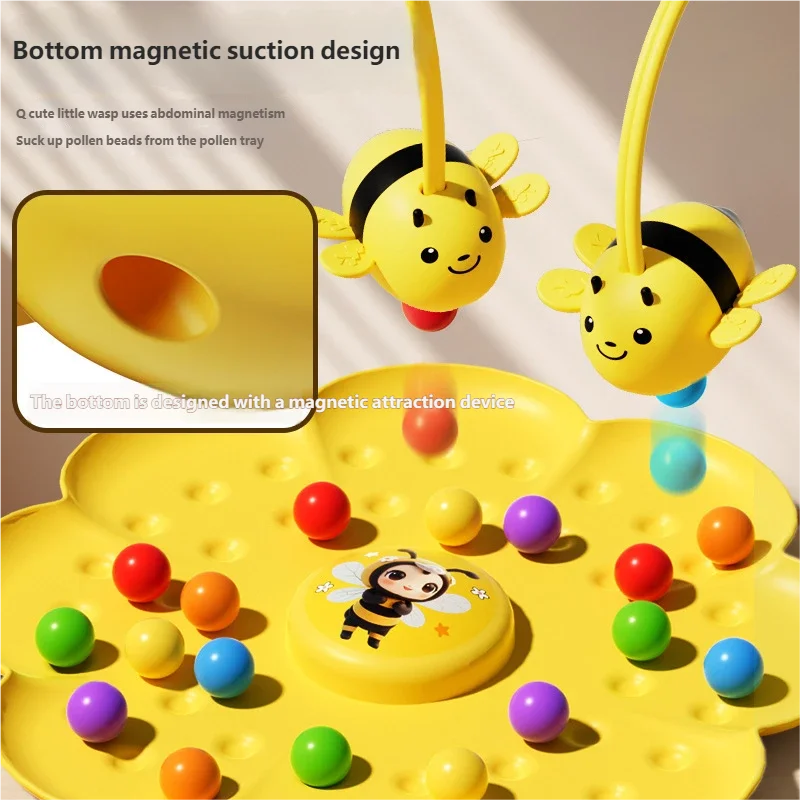 La abeja recoge las bolitas con su imán