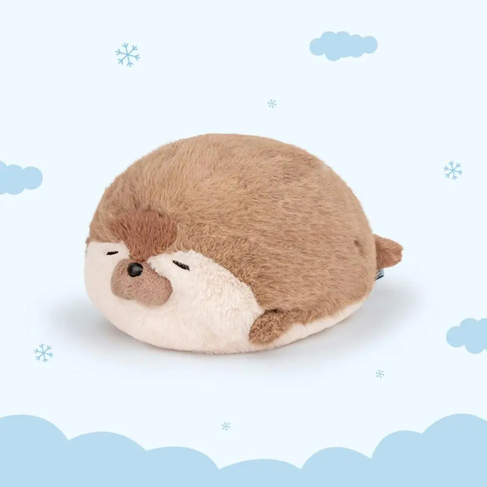 Foca de peluche marrón tumbada