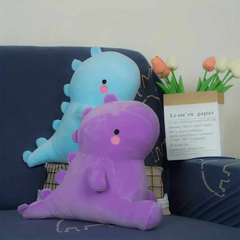 Dinosaurios de peluche azul y lila