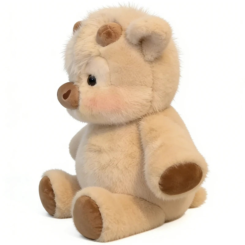 Vaca Highland de peluche sentada