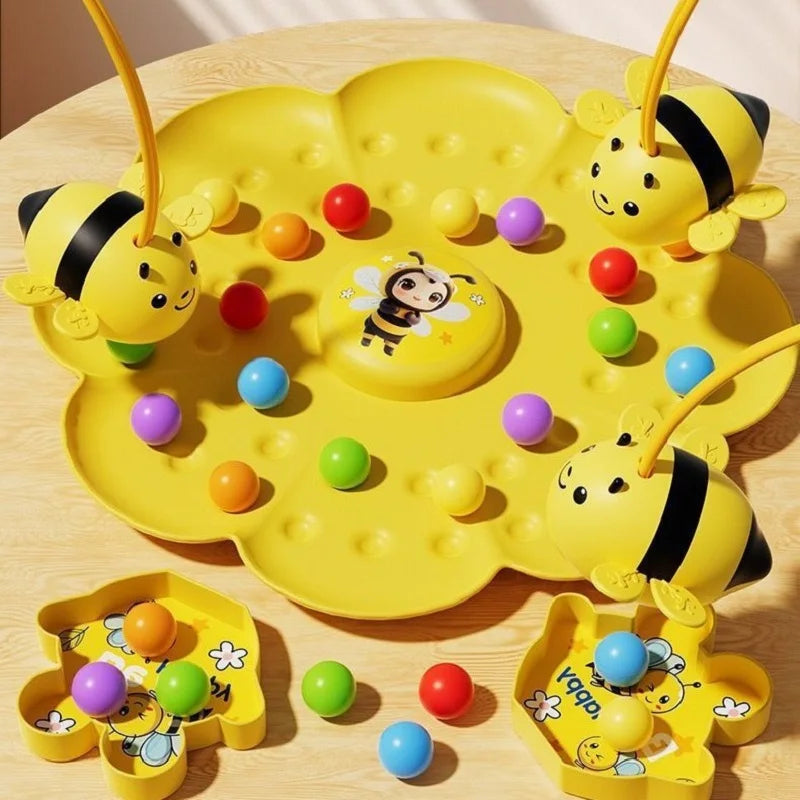 Tablero en forma de flor con bolitas de colores y abejas